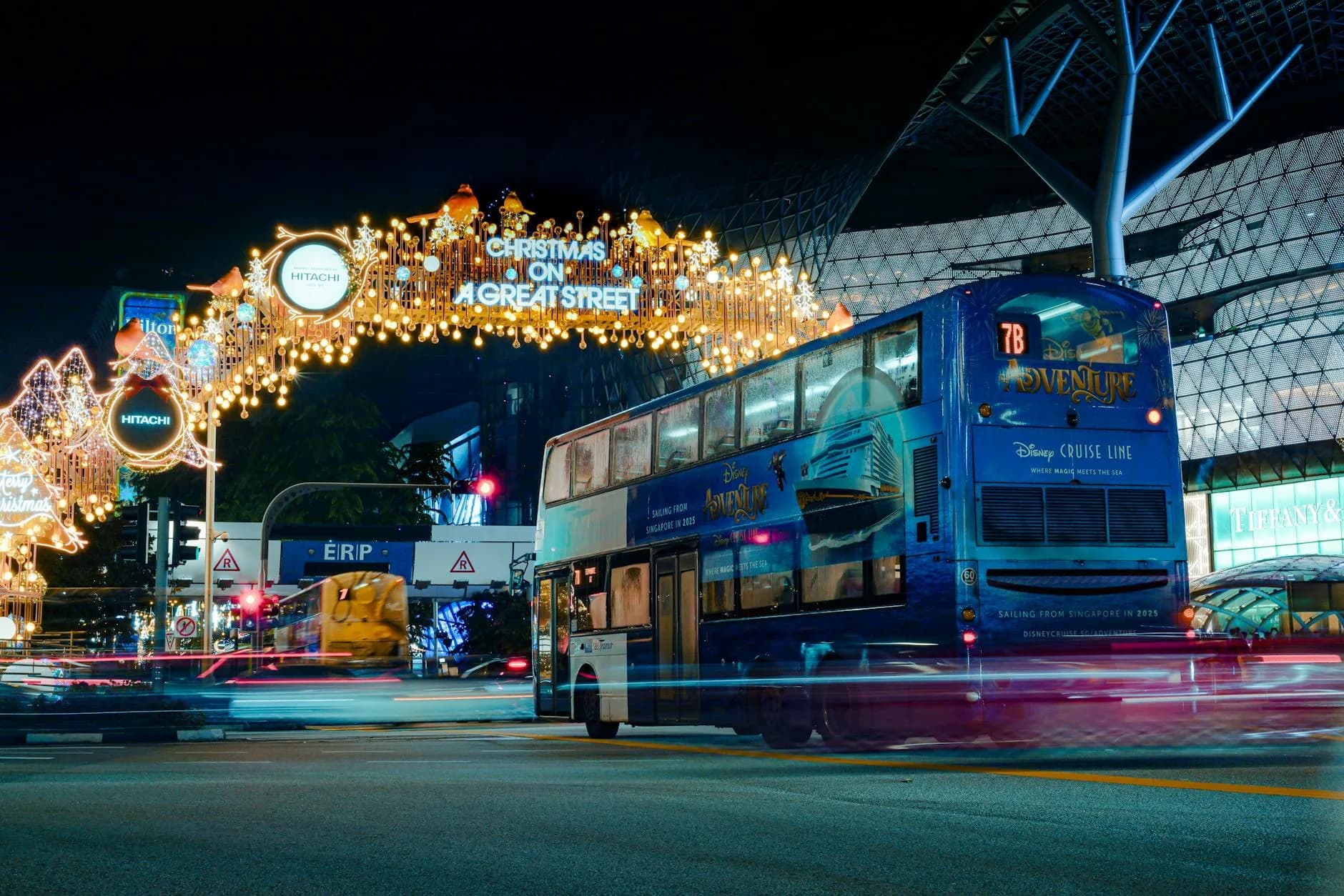 festive night bus under christmas lights in singapore