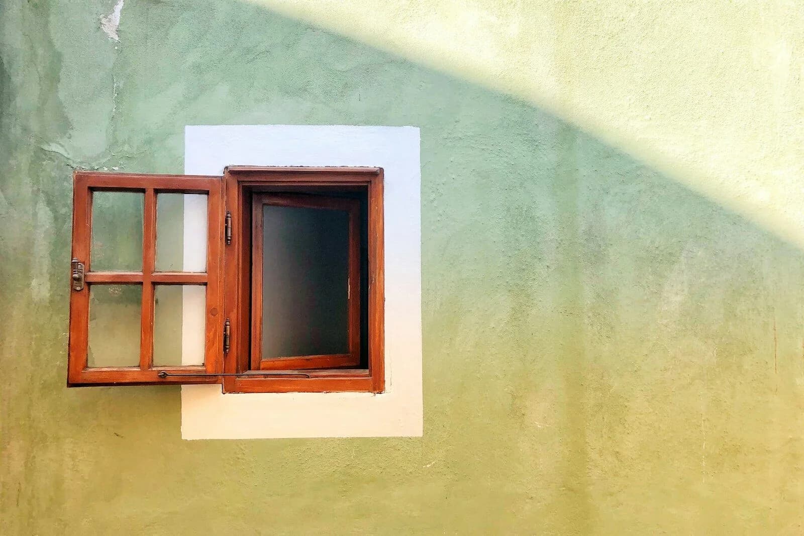 opened brown wooden window